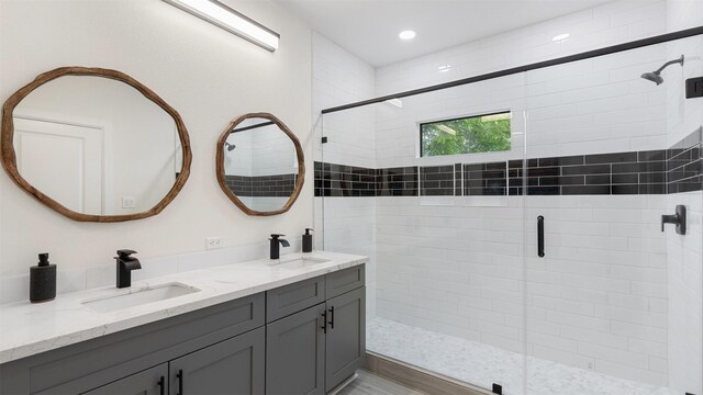 10002 Wilma Ln, Beach City, TX 77523 - full bathroom featuring a shower stall and double vanity