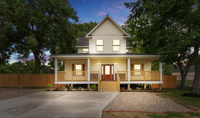 10002 Wilma Ln, Beach City, TX 77523 - view of front of home featuring covered porch and a shingled roof