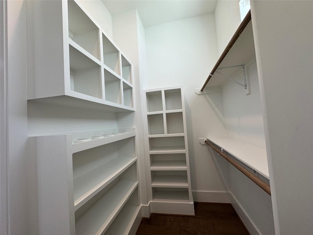 418 Bayou St, Houston, TX 77020 - spacious closet with dark wood-style flooring