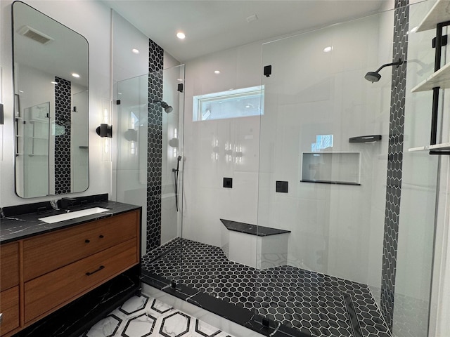 418 Bayou St, Houston, TX 77020 - bathroom with a stall shower, vanity, and tile patterned flooring