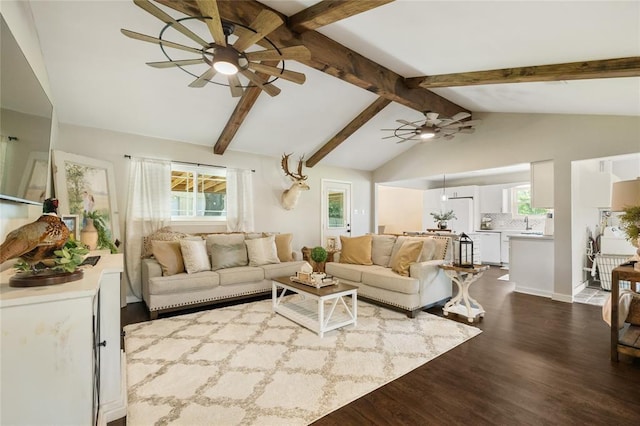 1209 Kansas Ave S, Anahuac, TX 77514 - living room with ceiling fan and dark wood-style floors