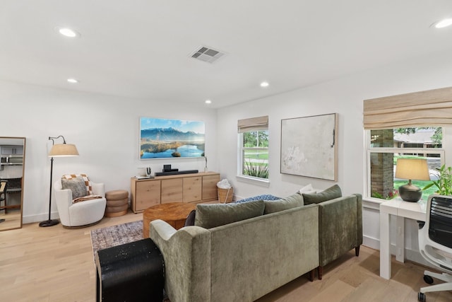 2327 Lamonte Ln, Houston, TX 77018 - living room featuring recessed lighting and light wood-style floors