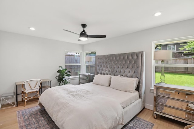 2327 Lamonte Ln, Houston, TX 77018 - bedroom with multiple windows, wood finished floors, recessed lighting, and ceiling fan