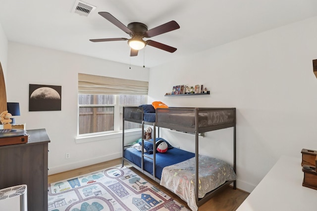 2327 Lamonte Ln, Houston, TX 77018 - bedroom featuring wood finished floors and a ceiling fan