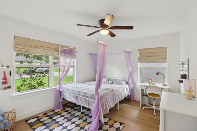 2327 Lamonte Ln, Houston, TX 77018 - bedroom featuring wood finished floors and a ceiling fan