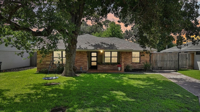 2327 Lamonte Ln, Houston, TX 77018 - view of front of property featuring concrete driveway, brick siding, roof with shingles, and a porch