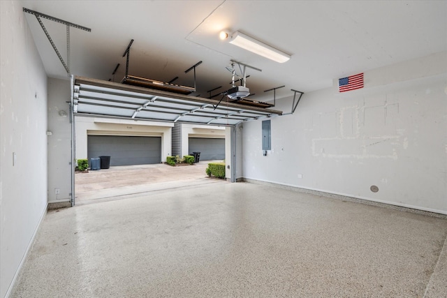 3115 Leeland St, Houston, TX 77003 - garage with electric panel and a garage door opener