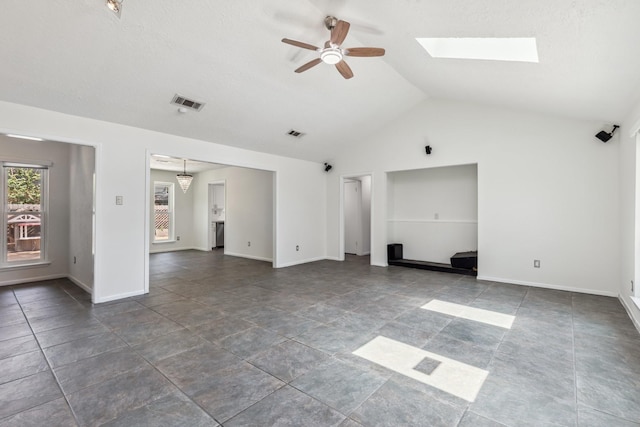 11406 Meadow Lake Dr, Houston, TX 77077 - unfurnished living room featuring ceiling fan, vaulted ceiling, and a skylight
