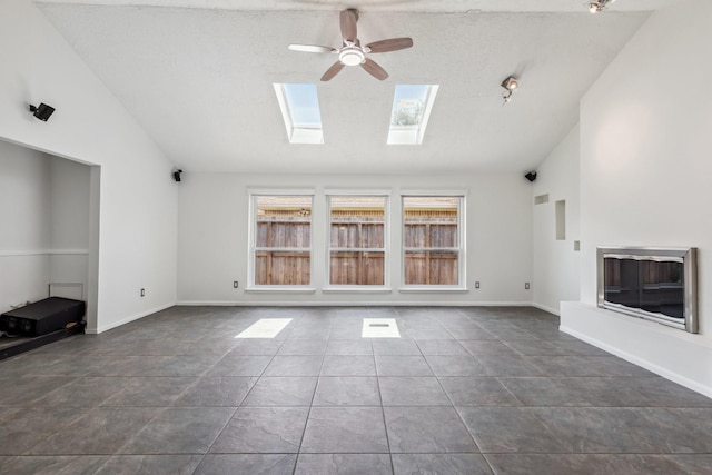 11406 Meadow Lake Dr, Houston, TX 77077 - unfurnished living room with ceiling fan, vaulted ceiling, and a skylight