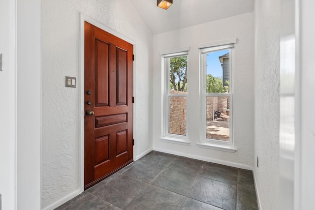 11406 Meadow Lake Dr, Houston, TX 77077 - foyer featuring a textured wall and vaulted ceiling