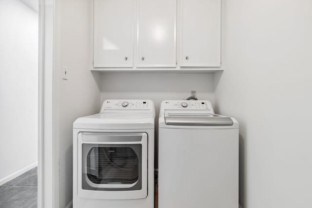 11406 Meadow Lake Dr, Houston, TX 77077 - laundry room with washer and dryer and cabinet space