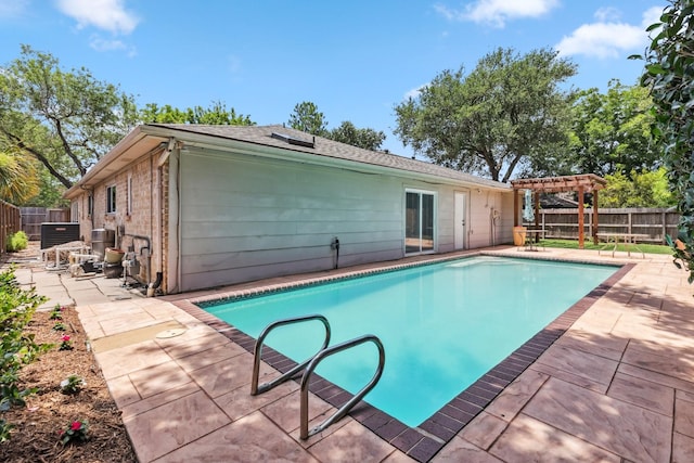 11406 Meadow Lake Dr, Houston, TX 77077 - view of swimming pool featuring a pergola, a fenced backyard, and a patio