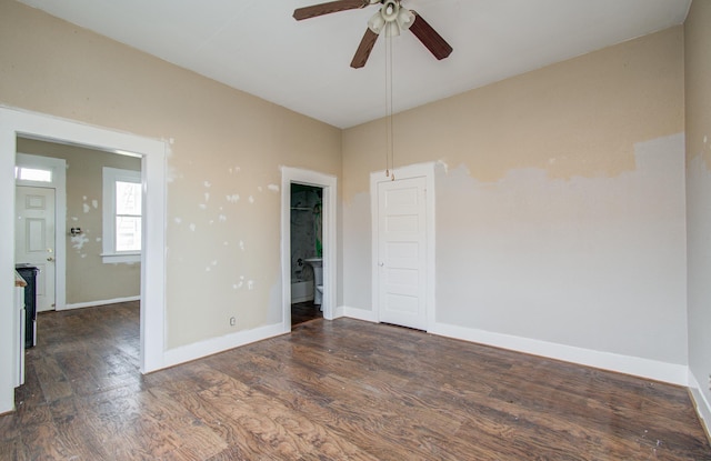 3412 Avenue S, Galveston, TX 77550 - spare room with a ceiling fan and dark wood-style flooring