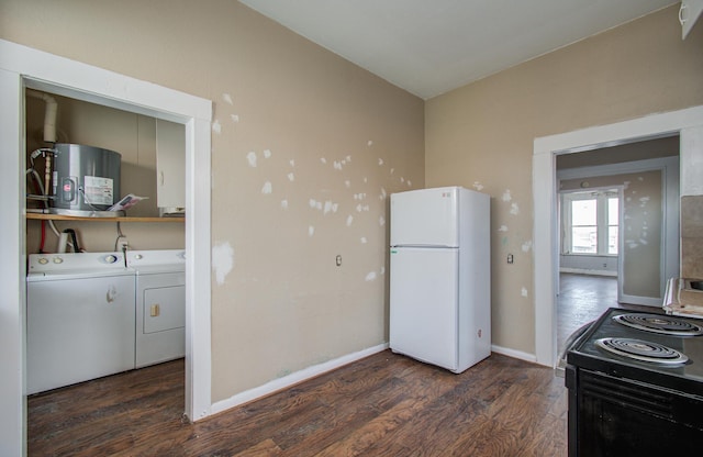 3412 Avenue S, Galveston, TX 77550 - kitchen featuring freestanding refrigerator, washing machine and clothes dryer, water heater, electric range, and wood finished floors