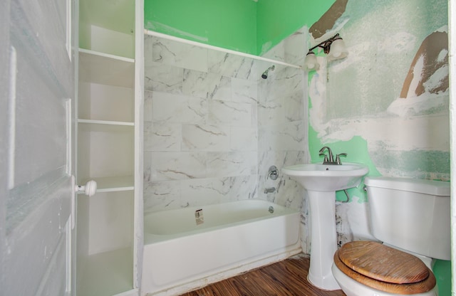 3412 Avenue S, Galveston, TX 77550 - full bathroom featuring shower / bathtub combination and wood finished floors