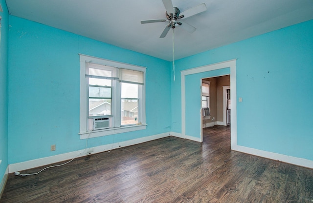 3412 Avenue S, Galveston, TX 77550 - spare room featuring dark wood-style flooring, a ceiling fan, and cooling unit