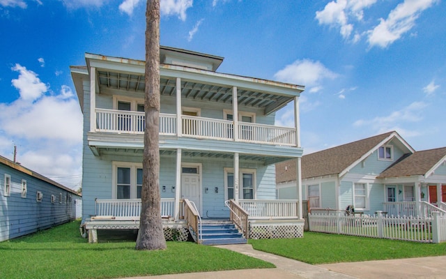 3412 Avenue S, Galveston, TX 77550 - view of front of house with a balcony and covered porch