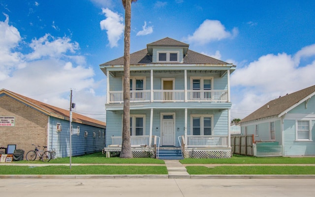 3412 Avenue S, Galveston, TX 77550 - view of front of home featuring a balcony and covered porch