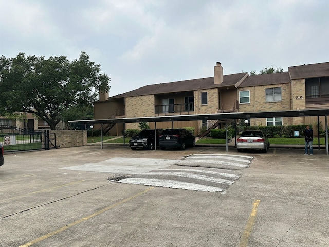 10555 Turtlewood Ct Unit 613, Houston, TX 77072 - view of covered parking lot