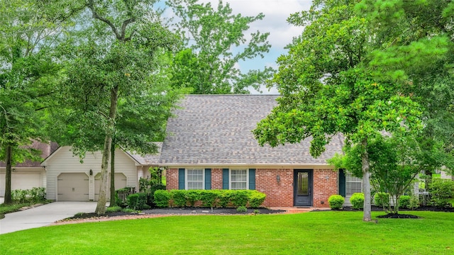 738 Stone Mountain Dr, Conroe, TX 77302 - view of front of house with concrete driveway, roof with shingles, an attached garage, and a front yard