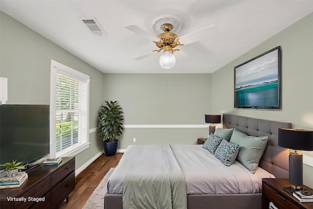 738 Stone Mountain Dr, Conroe, TX 77302 - bedroom featuring dark wood finished floors and ceiling fan