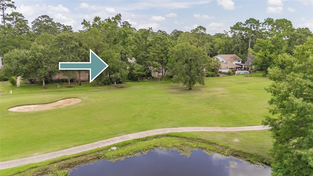 738 Stone Mountain Dr, Conroe, TX 77302 - view of community with a water view, a yard, and view of golf course