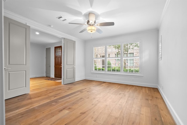 1156 Mosaico Ln, Houston, TX 77055 - spare room featuring ornamental molding, light wood-type flooring, and ceiling fan