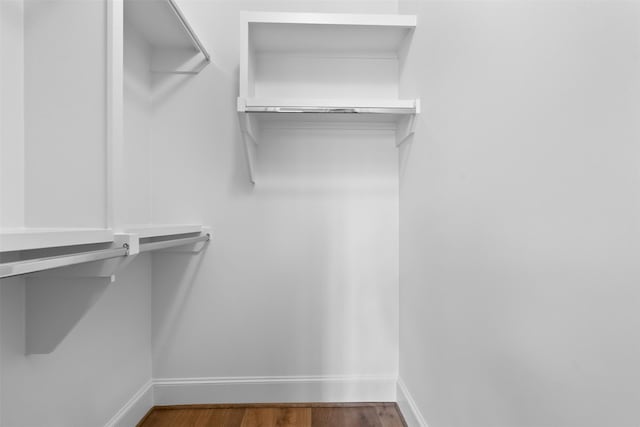 1156 Mosaico Ln, Houston, TX 77055 - spacious closet featuring wood finished floors