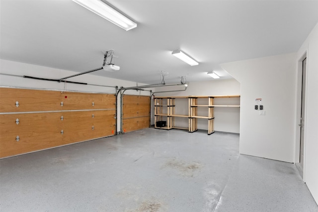 1156 Mosaico Ln, Houston, TX 77055 - garage featuring a garage door opener