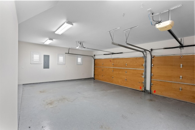 1156 Mosaico Ln, Houston, TX 77055 - garage featuring a garage door opener and electric panel