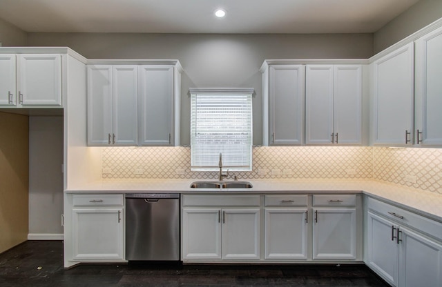 6914 N Elmwood Trl, Katy, TX 77493 - kitchen featuring dishwasher, white cabinets, recessed lighting, tasteful backsplash, and light countertops