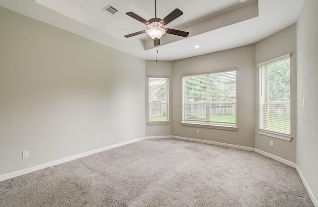 6914 N Elmwood Trl, Katy, TX 77493 - spare room featuring carpet floors, a ceiling fan, recessed lighting, and a raised ceiling