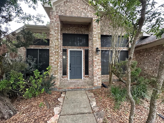 2606 Iris Ct, Pearland, TX 77584 - doorway to property featuring brick siding