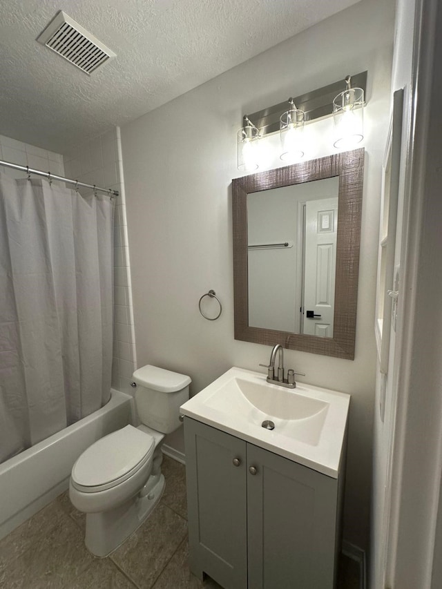 2606 Iris Ct, Pearland, TX 77584 - full bath with vanity, shower / bath combo with shower curtain, a textured ceiling, and tile patterned floors