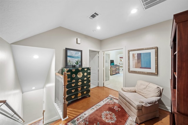 7417 Teaswood Dr, Conroe, TX 77304 - living area with an upstairs landing, light wood-style floors, lofted ceiling, and recessed lighting