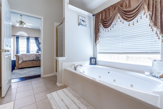 8710 Candleshine Cir, Houston, TX 77095 - ensuite bathroom featuring a stall shower, a jetted tub, a ceiling fan, and tile patterned floors