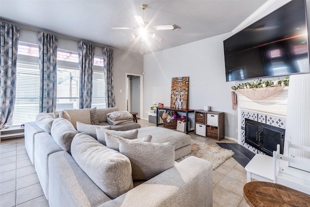 8710 Candleshine Cir, Houston, TX 77095 - living room featuring a ceiling fan, light tile patterned floors, and a fireplace