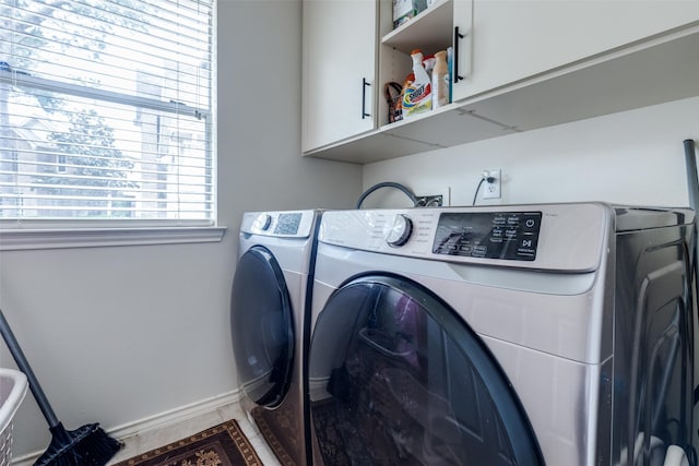 8710 Candleshine Cir, Houston, TX 77095 - laundry area featuring cabinet space and washing machine and dryer