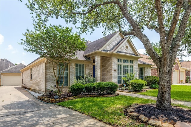 8710 Candleshine Cir, Houston, TX 77095 - view of front of house with brick siding, a front yard, a garage, and a shingled roof