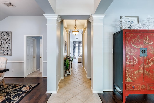 8710 Candleshine Cir, Houston, TX 77095 - hall with decorative columns, light tile patterned floors, and lofted ceiling