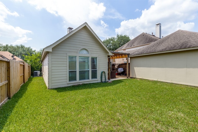 8710 Candleshine Cir, Houston, TX 77095 - rear view of house with a patio area and a chimney