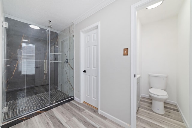 23703 Shaw Perry Ln, Katy, TX 77493 - full bath featuring a marble finish shower, wood finished floors, and crown molding