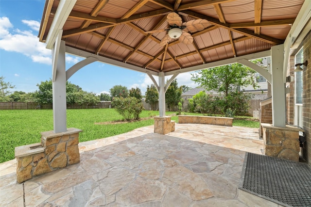23703 Shaw Perry Ln, Katy, TX 77493 - fenced backyard with a gazebo, a ceiling fan, and a patio