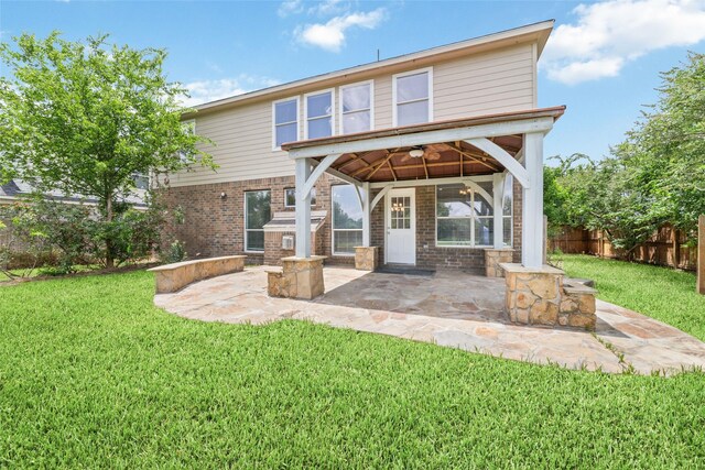 23703 Shaw Perry Ln, Katy, TX 77493 - back of property featuring a patio area and brick siding