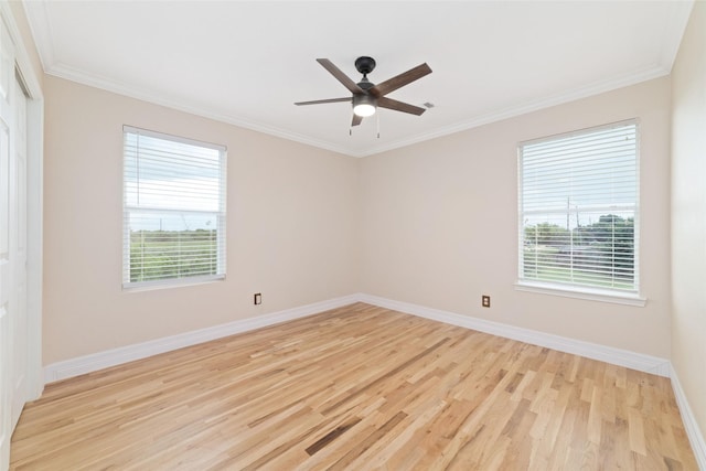 23703 Shaw Perry Ln, Katy, TX 77493 - empty room featuring light wood-type flooring, plenty of natural light, ornamental molding, and a ceiling fan