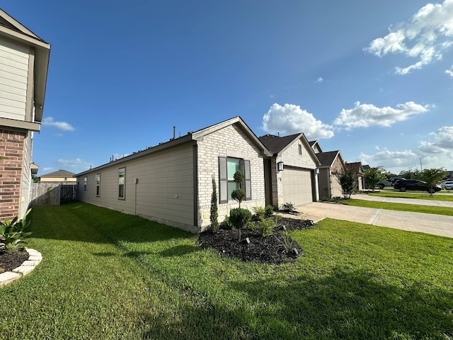 4215 Stuebner Hill Dr, Houston, TX 77068 - view of side of property with concrete driveway, brick siding, and an attached garage
