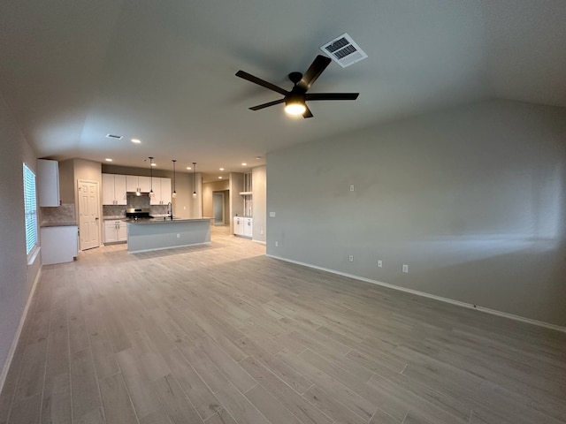 4215 Stuebner Hill Dr, Houston, TX 77068 - unfurnished living room with light wood-type flooring, ceiling fan, and recessed lighting