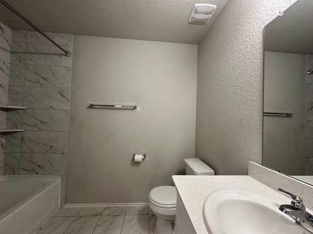4215 Stuebner Hill Dr, Houston, TX 77068 - bathroom featuring marble finish flooring, vanity, a textured ceiling, and  shower combination
