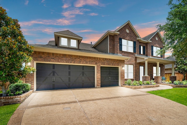 19522 Hope Springs Ln, Cypress, TX 77433 - view of front of property with brick siding, an attached garage, concrete driveway, and a shingled roof