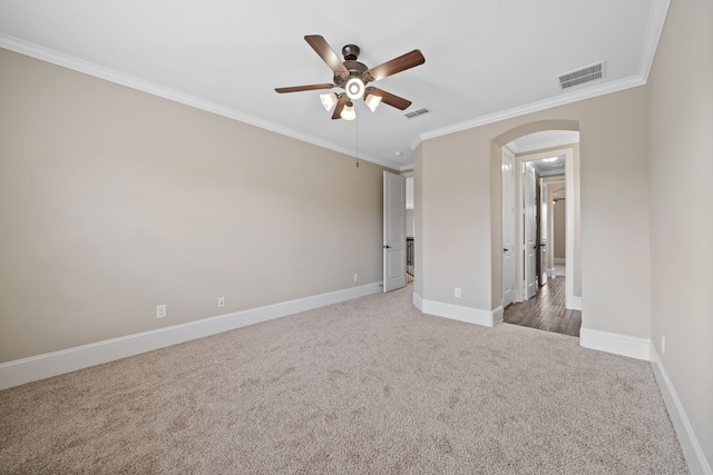 19522 Hope Springs Ln, Cypress, TX 77433 - unfurnished bedroom with arched walkways, carpet flooring, crown molding, and ceiling fan